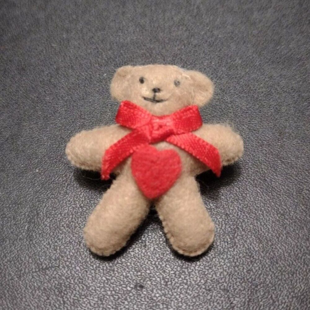 Small stuffed teddy bear brooch
